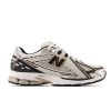 Men New Balance Lifestyle | 1906R Metallic Silver With Metallic Gold